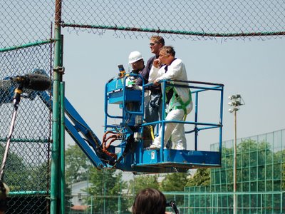 City workmen on the hydraulic lift used to dismantle wild Quaker Parrot nests in the Bronx, NY